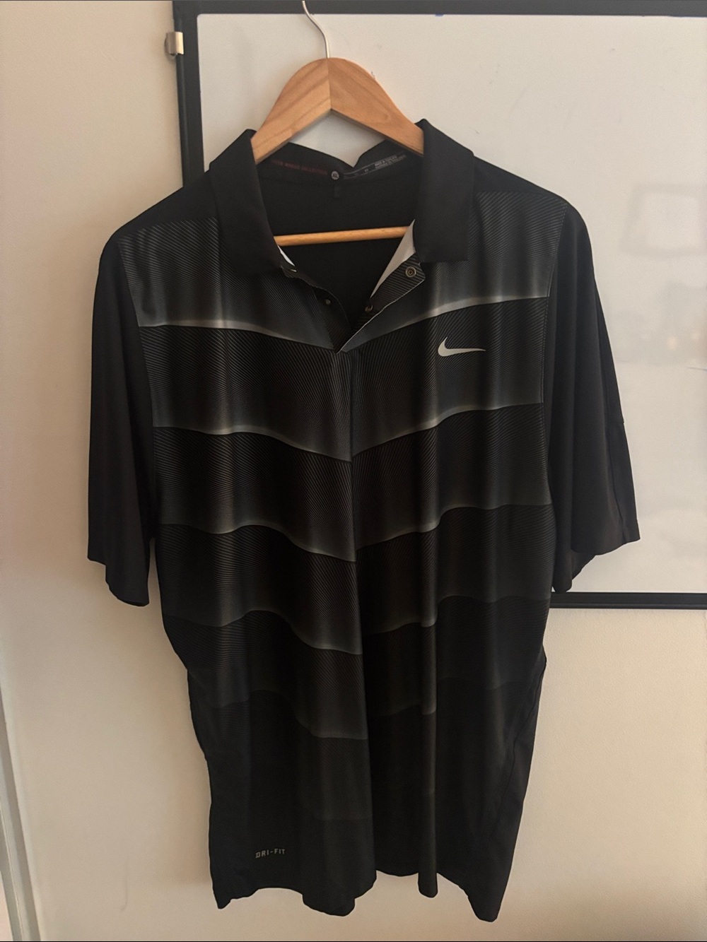 Nike Black Men’s Performance Polo with Subtle Wave Stripes
